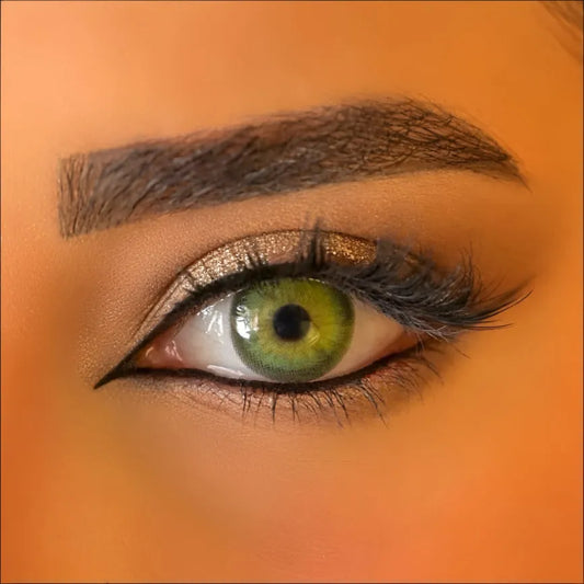 Model close-up wearing Olivine Green Contact Lenses by Venus – natural green eye color